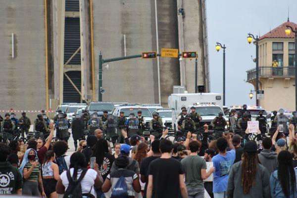 Police guarding the bridge last night so protesters can't cross.