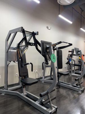 Exerbotics Equipment  Left: chest press/ row machine  Right: overhead press/ pull-down machine