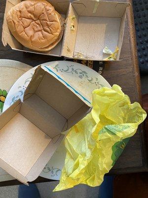 Containers for fish sandwich, cheeseburger, and big mac to make the land, sea, air burger.