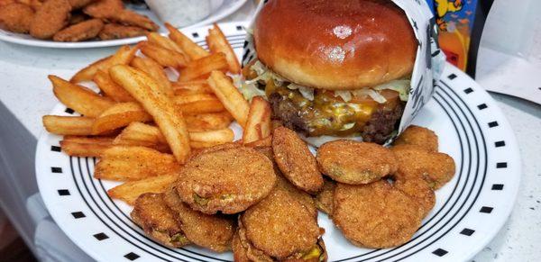 Fries and pickle chips were a little stale, but our Air Fryer helped a lot. Cheezy Burger was good though.