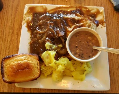 Smothered steak, cabbage, black eyed peas, mashed potatoes, and cornbread.  Excellent meal.