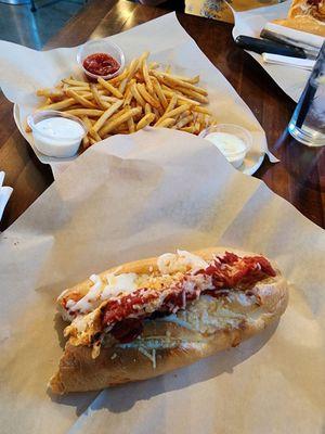 Chicken Parm sandwich and basket of fries