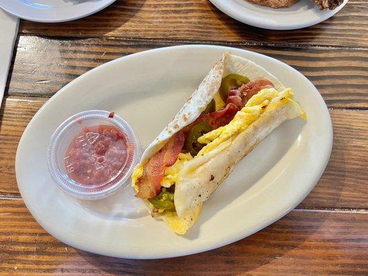 Breakfast taco (bacon and jalapeño additional)- comes with salsa!