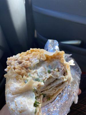 A super carnitas burrito.