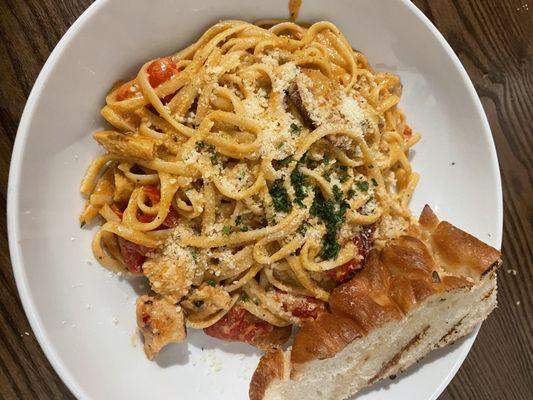 Creole chicken and sausage linguine (Blackened chicken, andouille sausage with roasted red pepper tossed in a spicy creole cream sauce)