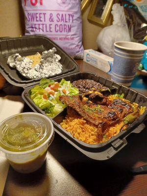 Mystery meat Carne Asada cooked to a chewy crisp with a side of watery guacomole.