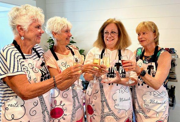 Champagne toast between friends.
Those ladies were flight attendants for any years, now once a year they get back together and have fun.