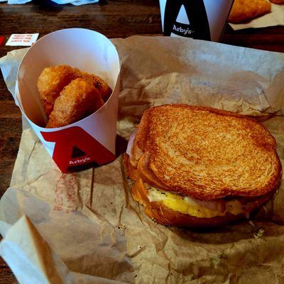 Ham, Egg & Cheese Sourdough Sandwich w/ Hashbrowns.