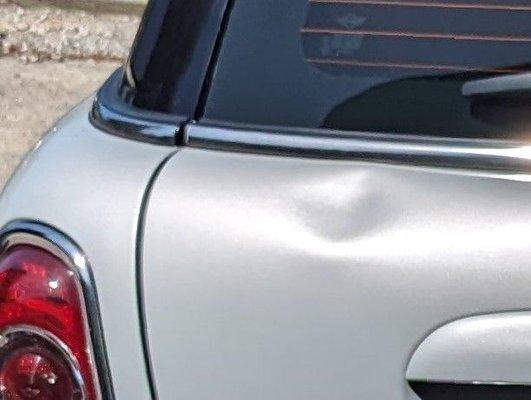 Silver MINI, dent on liftgate