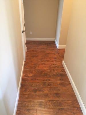 Looks great! TruCraft Hickory Bourbon Hand scraped Laminate Flooring