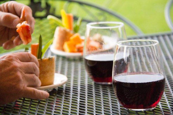 Cheers from the patio overlooking the 18th green and San Juan mountain range.