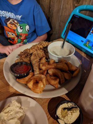 Steak Fingers and Steak fries off of the kids menu with dipping gravy! Really good our 7 year old said!!!