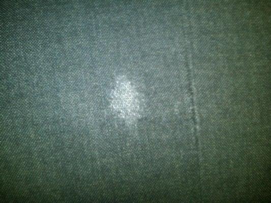 One of several spots due to fabric abrasion on my suits after taking them to this cleaner.