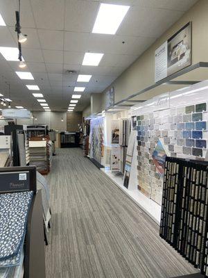 We have a large color wall of carpet options from Shaw