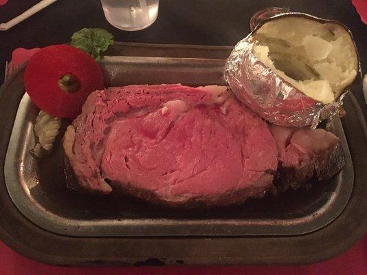 Regular prime rib medium rare with potato.