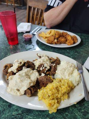 Huge order of chicken livers w corn pudding and mashed potatoes,  my fork is for size reference.