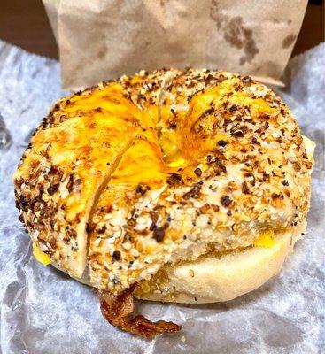 Bacon egg and cheese on jalapeño cheddar everything bagel