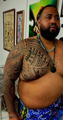 Polynesian Sleeve and Chest Panel Tattoo by The Red Parlour Tattoo and Piercing