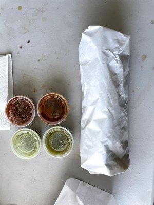 Overhead of the breakfast burrito and one of each salsa