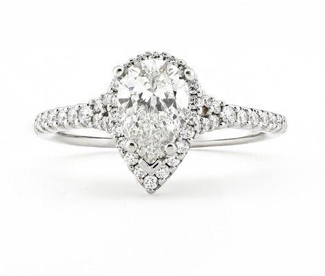 Custom engagement rings are our specialty- like this pear shaped Diamond halo ring.