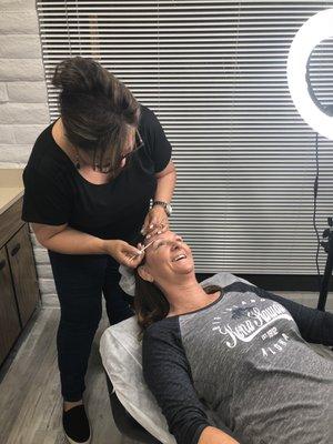 Action shot of Blanca microblading brows