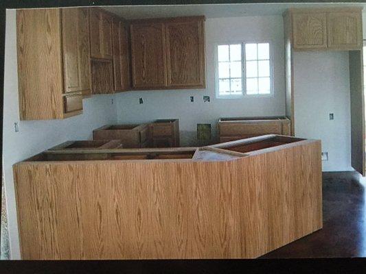 Installing cabinets for new kitchen