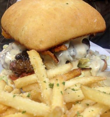 Hamburger with queso, bacon and Parmesan fries. Yum!