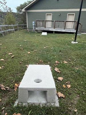 Concrete corn hole. Unsure where bean bags are; it was rainy most of our stay so we didn't get to use this.