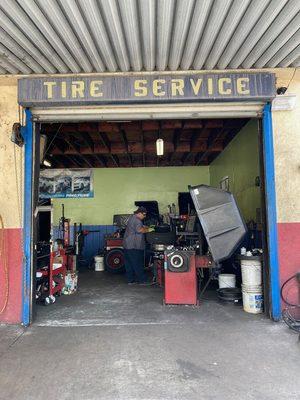 holey tire dealt with expeditiously by rockin' mechanic.