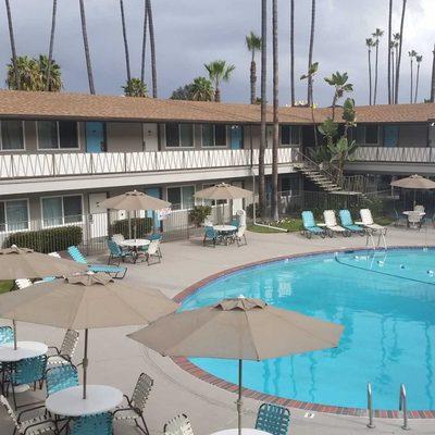 White tarps used a privacy fence at a San Diego hotel