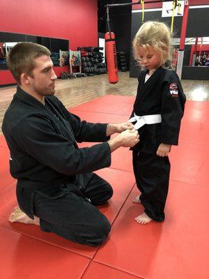 My daughter earning her first stripe