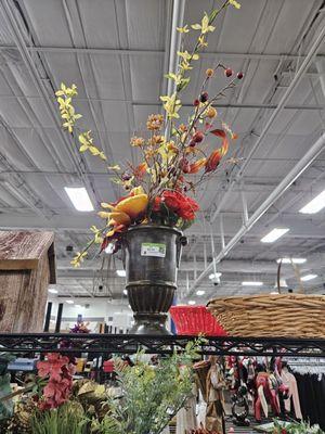 Old, used,  dusty, plastic flower arrangement in plastic bottom 6.49