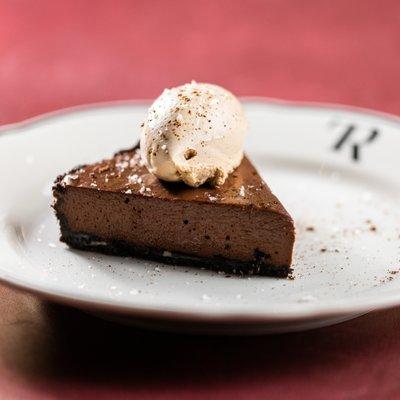 Chocolate Silk Pie made with a scratch chocolate biscuit crust and creamy chocolate custard coffee whipped cream on top.