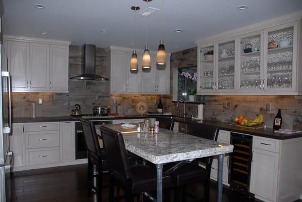 Kitchen under cabinets lights plus 3 pendents over the table, purchased with Jose help at Mi Casa Lighting in Woodland Hills