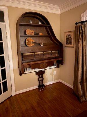 Piano turned into a bookcase