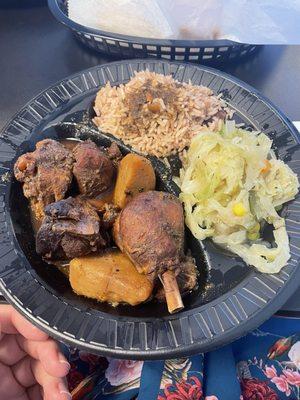 Brown stew chicken, rice and beans, cabbage