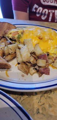 Max omelet, home fries & wheat toast