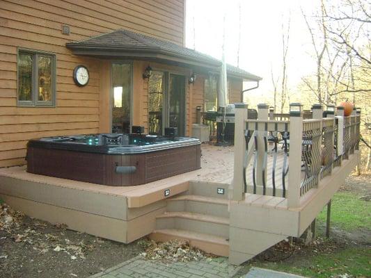 Bullfrog spa built into deck. Recipient of the APSP Midwest Chapter Silver Award of Excellence & APSP Region 5 Bronze Award