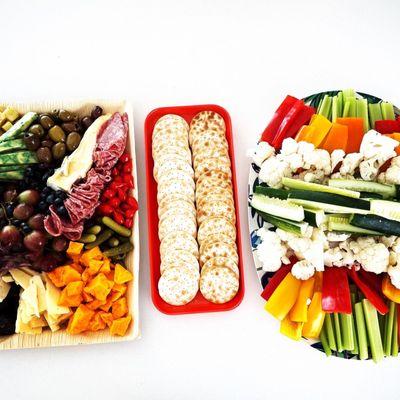 Charcuterie plate, crackers and veggie plate (veggies made at home)