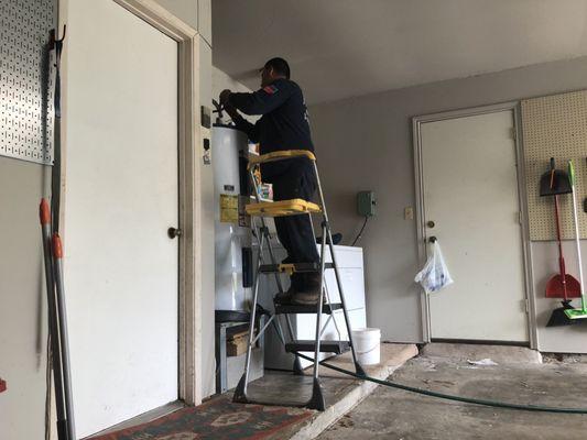 Ricky removing our old water heater