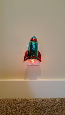 The greatest little night lite! A rocket ship with a "flame" flickering bulb on the bottom!