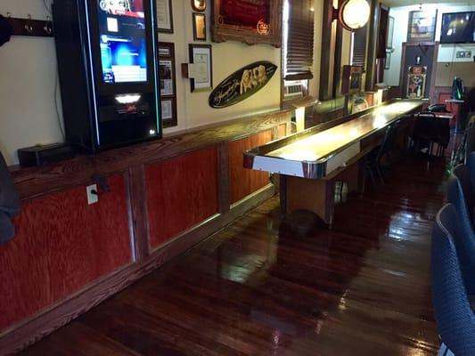 Our barroom has a vintage longboard shuffleboard, something we revere!