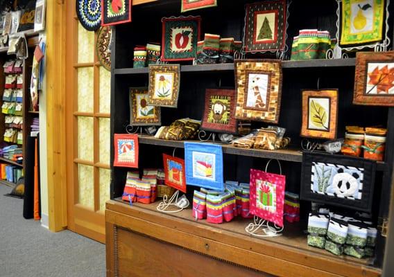 A display of miniature paper-piecing projects lives next to the wool department on the south end of the upper level.