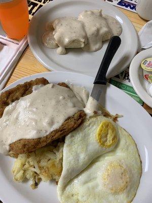 Chicken fried steak ($7.95- I believe) came with hash browns, two eggs, and biscuits and gravy!