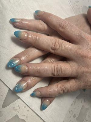 Light blue ombré with sparkles by Michael.