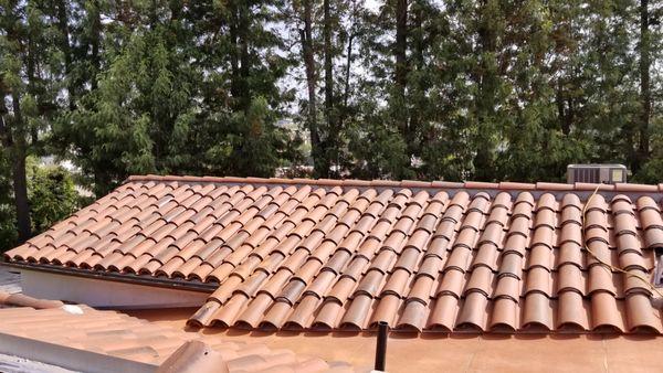 A recently completed Spanish Tile roofing project.