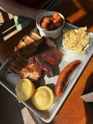 Full rack of ribs, sweet potato tots, mac and cheese, smoked polish sausage, cornbread muffins