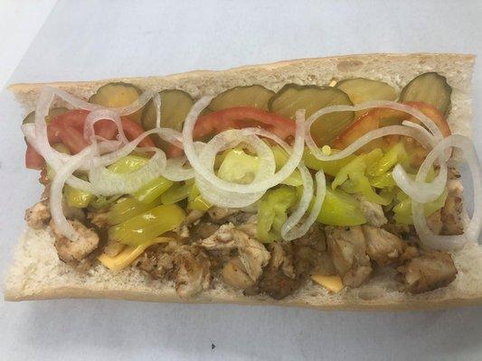 Chicken Sandwich comes with pickles, onion, banana peppers, tomato, American cheese, oil & oregano.