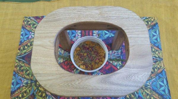 Medical herbs, and wooden stool used for herbal V steam treatments for women .