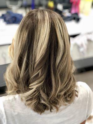 Highlights and blow dry with loose curls